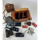 Leather camera case including Olympus XA 2 camera, Halina Panorama camera, Olympus AF-10 camera,