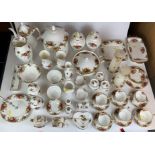 52 piece Royal Albert Country Rose tea set with ornaments including vases, jam pots, shoes,