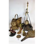 Quantity of brassware including clock, fire irons, coal bucket, bellows, goblet, triangular stand,