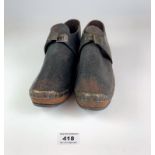 Pair of antique leather clogs