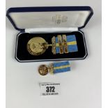 Boxed Hong Kong Service Medal and Royal Navy 1946-48 clasps and matching miniature medal