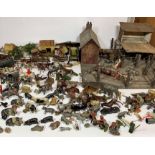 Wooden farmyard with buildings, accessories and animals. Farmyard measures 21” x 20” (possibly