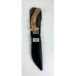 Bowie style knife with bone handle in leather scabbard, 12.75” length