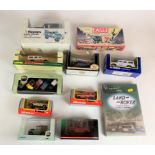 11 assorted boxed vehicles including Land Rovers, buses and trucks