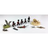 6 lead soldiers, 3 metal soldiers, tiepin, small lead ship, dogs scene, small onyx stand and crochet