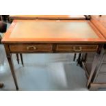 Cross banded inlaid desk on castors with leather top and 2 drawers. 28.5” high, 36” wide, 19” deep