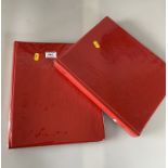 2 red albums of world stamps