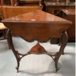Mahogany carved envelope table on castors. 25” per side closed, 31” open diameter, 29” high
