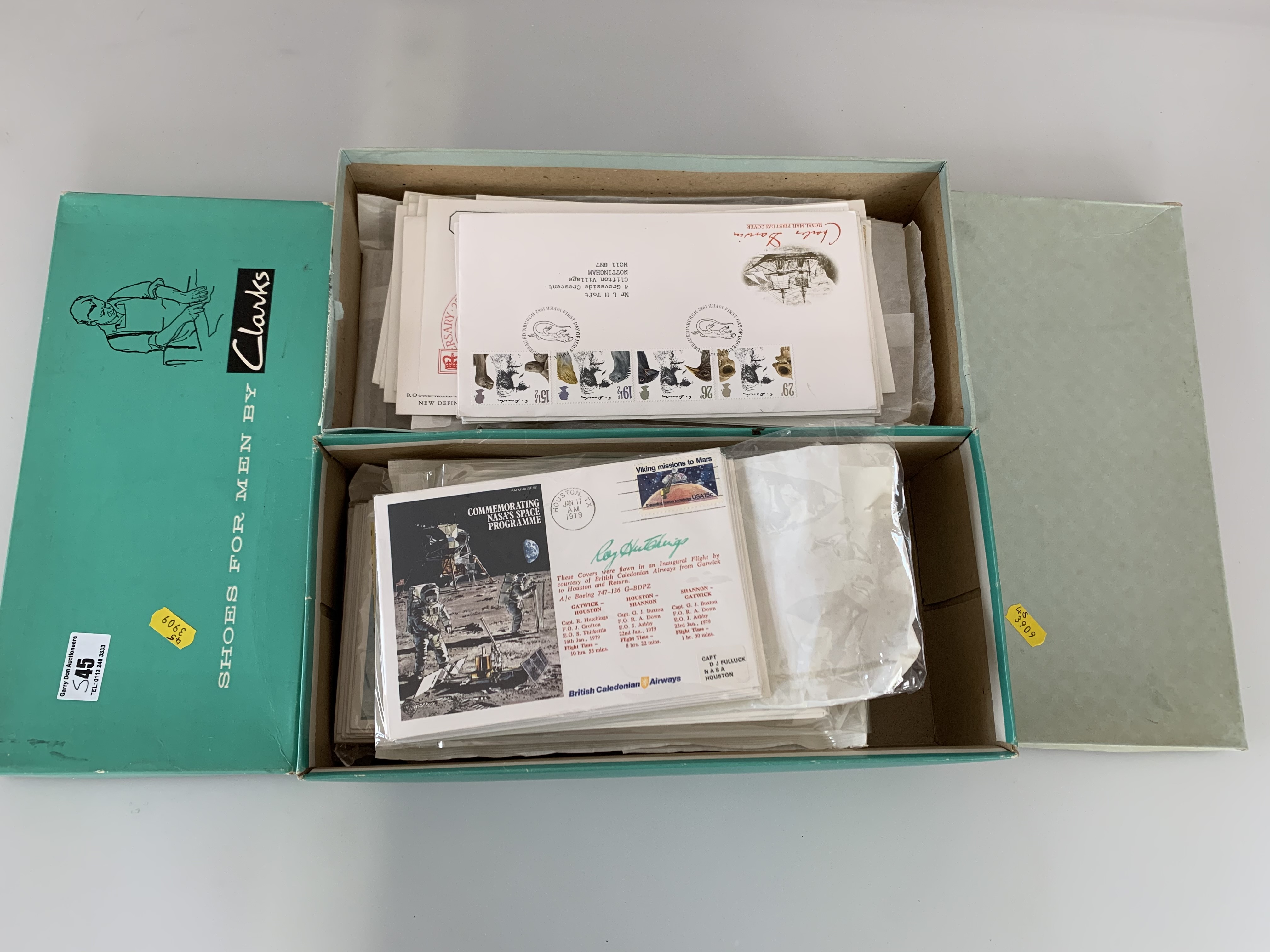 2 shoe boxes of First Day Covers