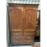 Mahogany linen press on chest, no interior shelves on top, additional hanging rails. 80” high, 47”