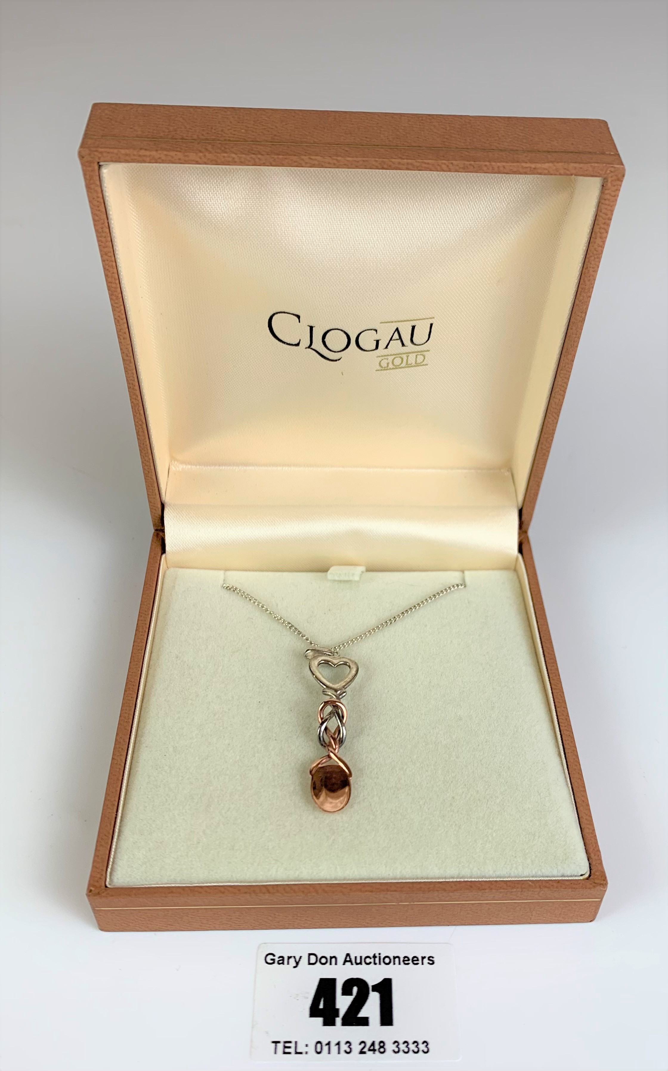 Boxed silver necklace with Clogau pendant. Length of necklace 18” and pendant 1.5”. Total w: 5.1