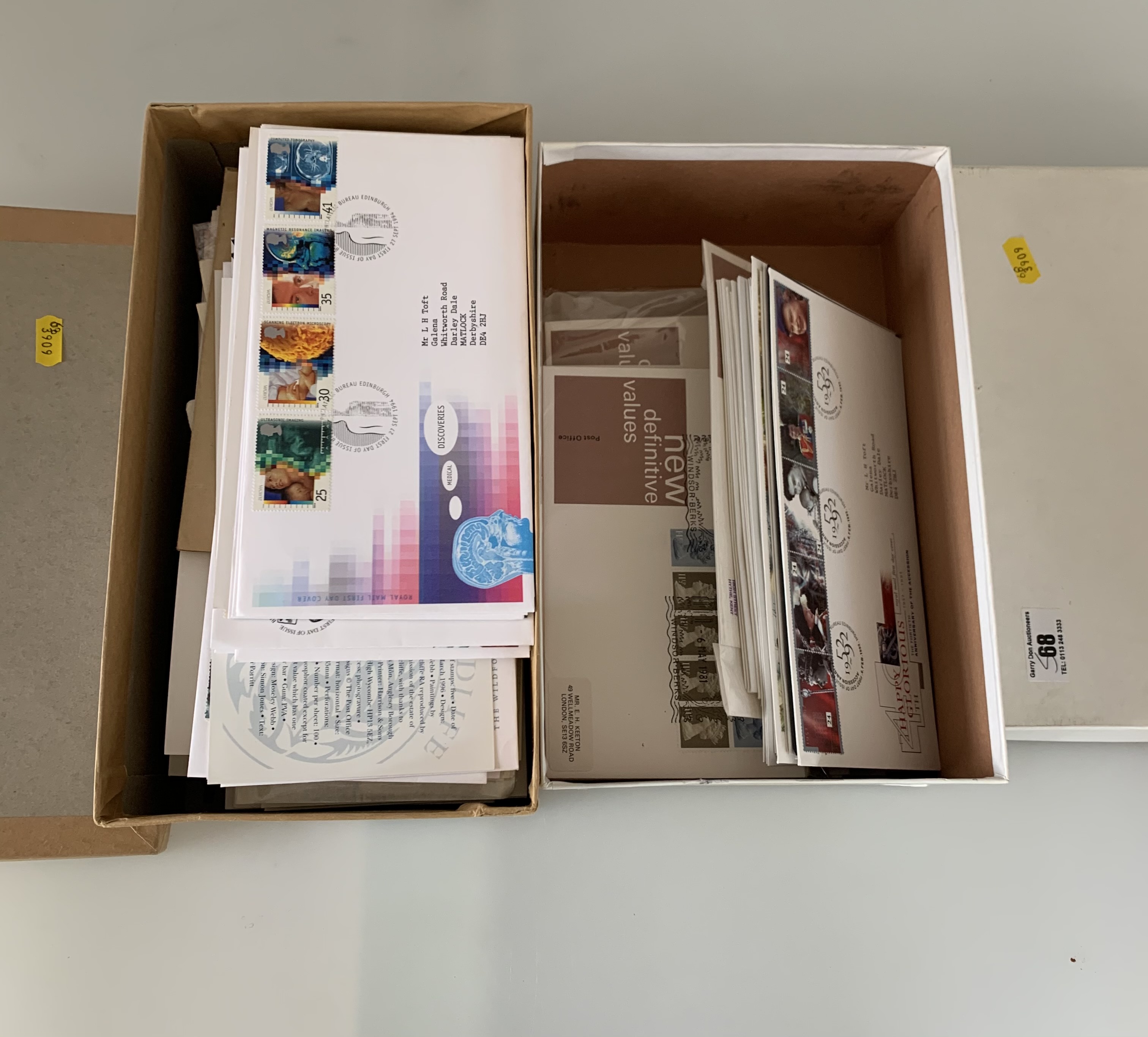 2 shoeboxes of First Day Covers