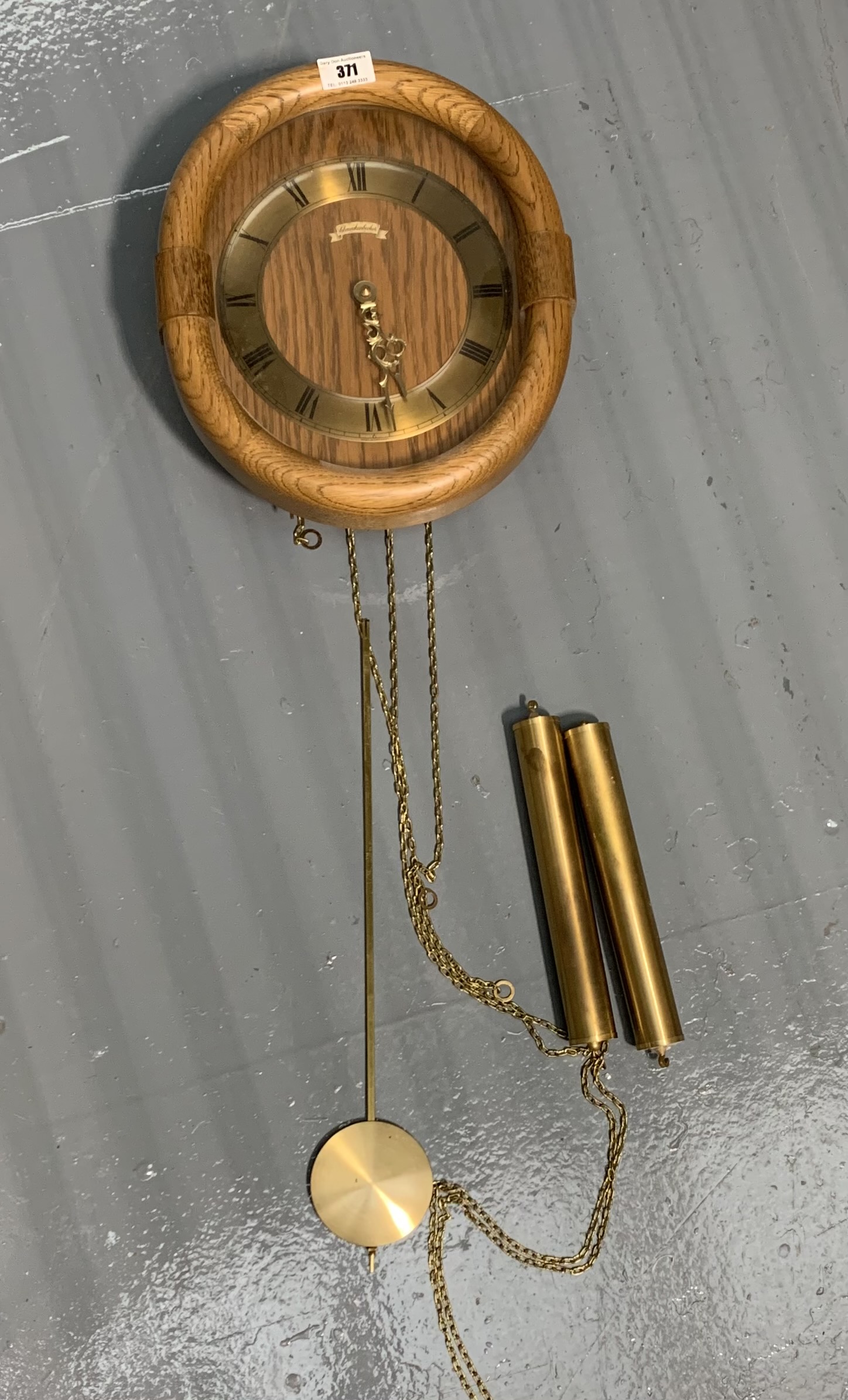 Modern German wall clock with pendulum and 2 weights