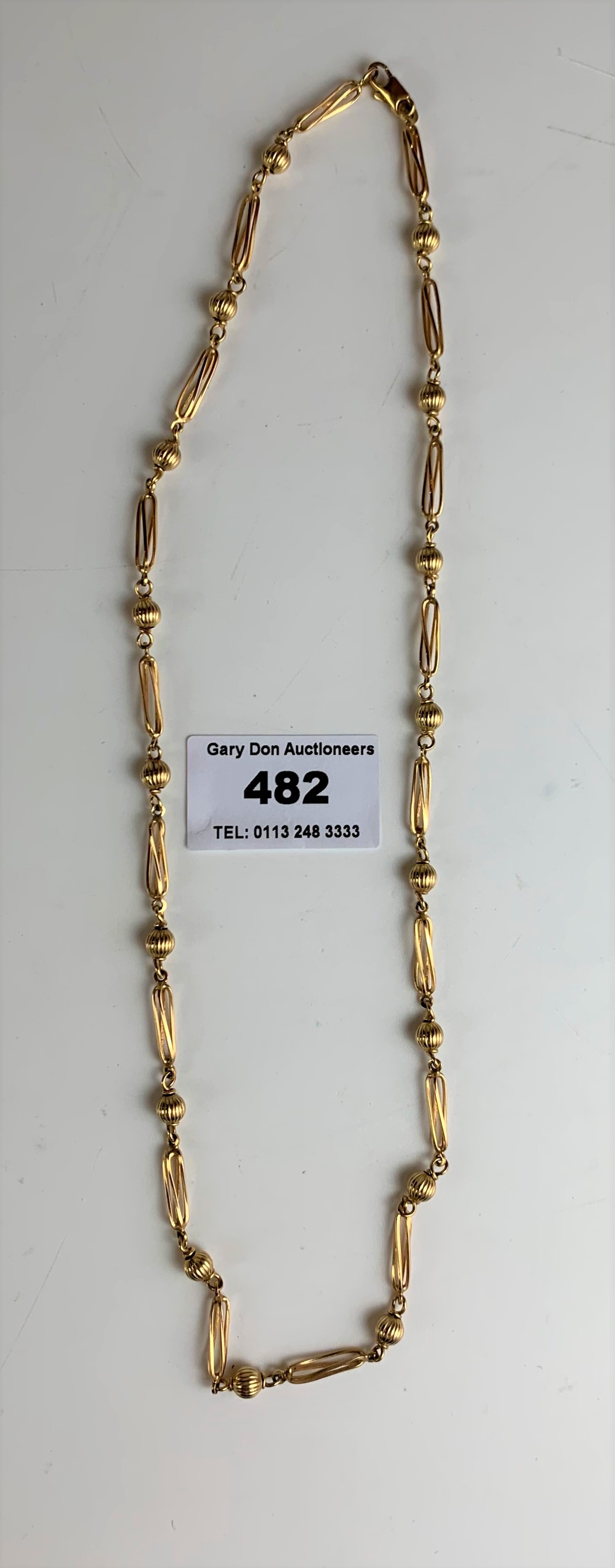 9k gold necklace, length 20”, w: 13.5 gms