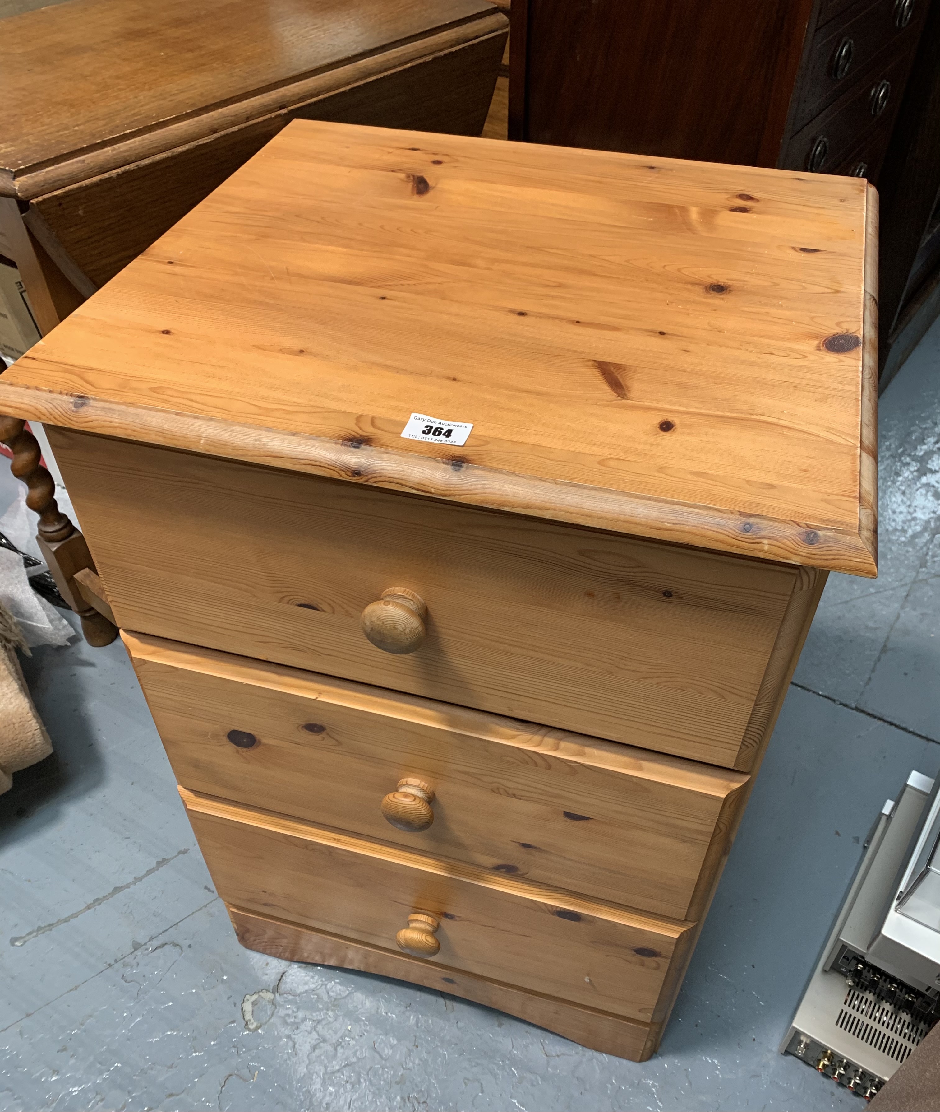 Pine bedside cabinet with 3 drawers. 19” wide, 17” deep, 28” high