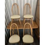 Blond Ercol dining table and 4 chairs. Table 60” long, 30” wide, 28” high
