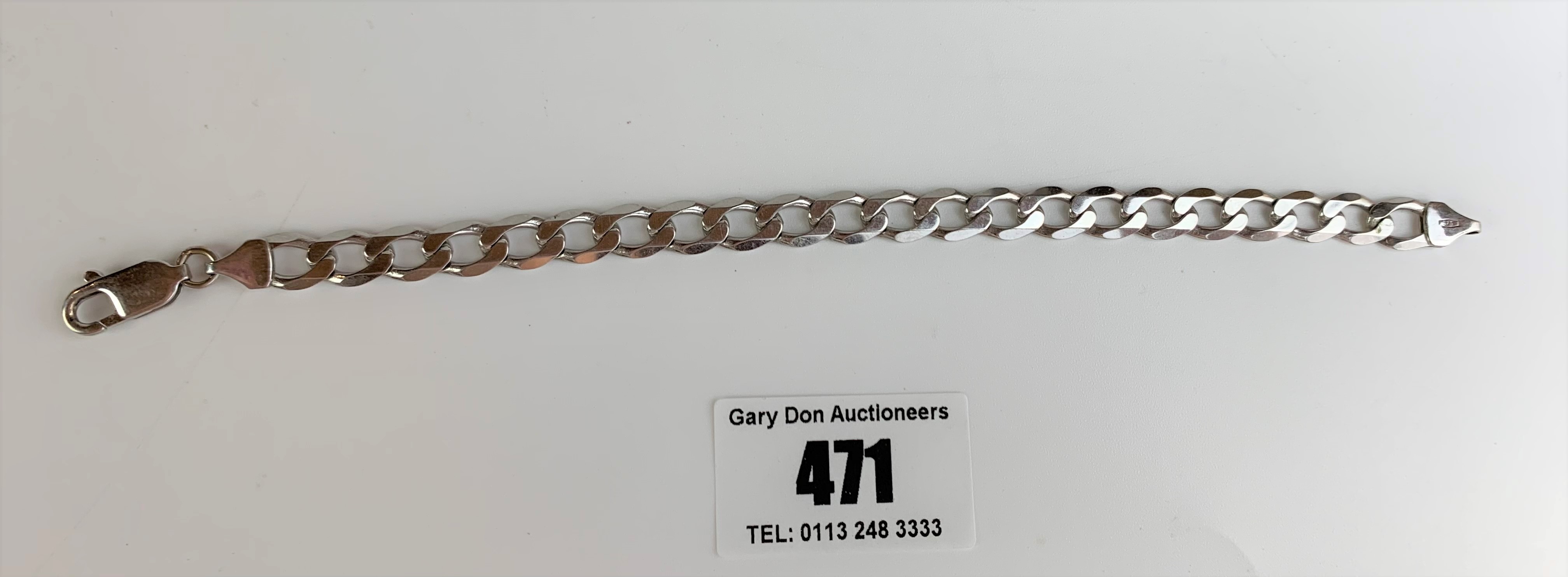 9k white gold bracelet, length 7”, w: 11.6 gms