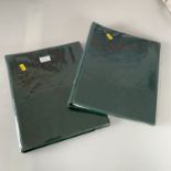 2 green albums of world stamps