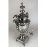 Large silver plated tea urn, 22” high. Good condition