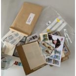 Roll of mint stamps and new and used stamps