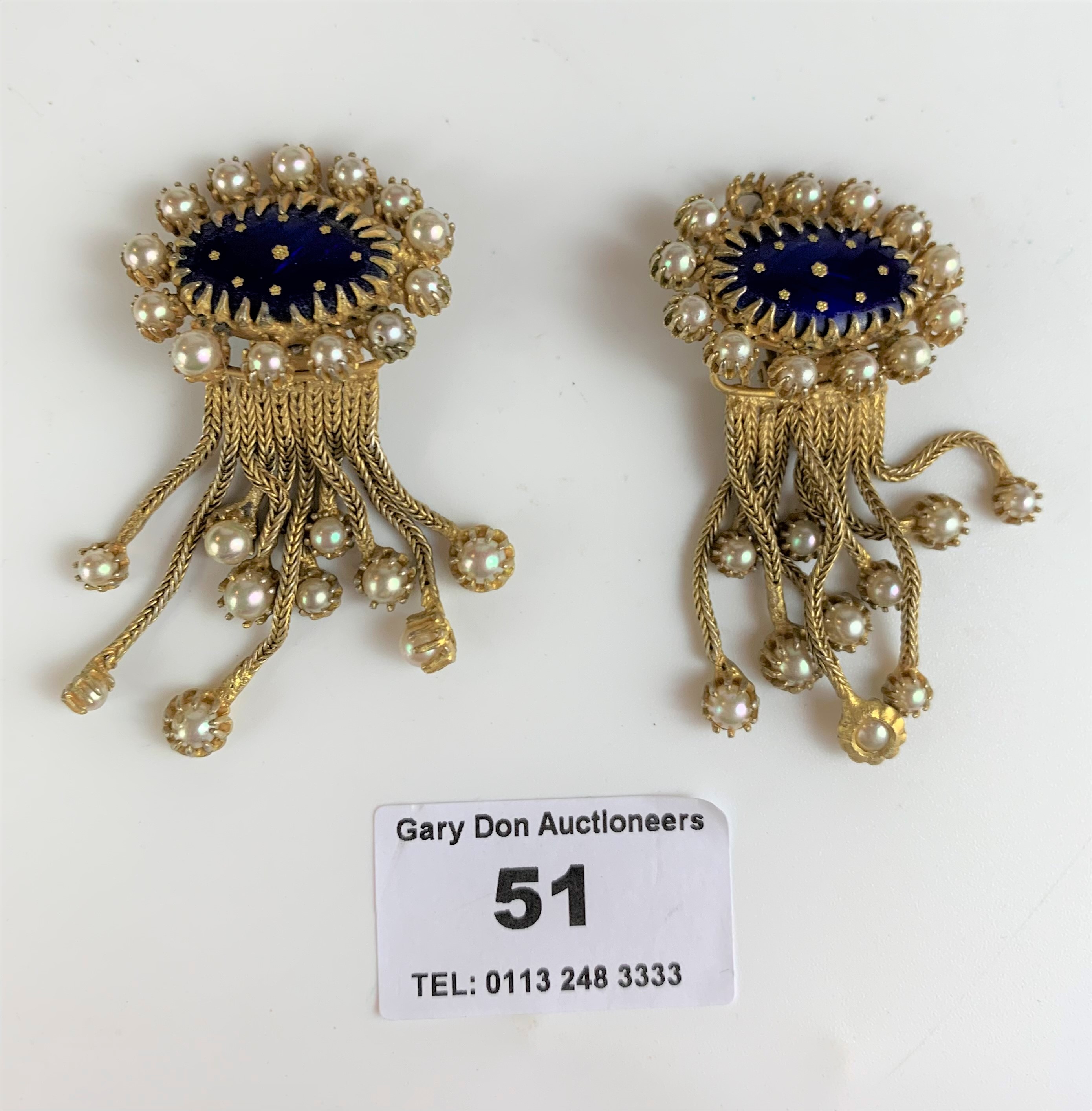 Pair of Christian Dior earrings by Michel Maer (1 pearl missing)