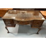 Bow fronted claw/ball foot sideboard with glass top and 5 drawers 50” wide, 26” deep, 31” high