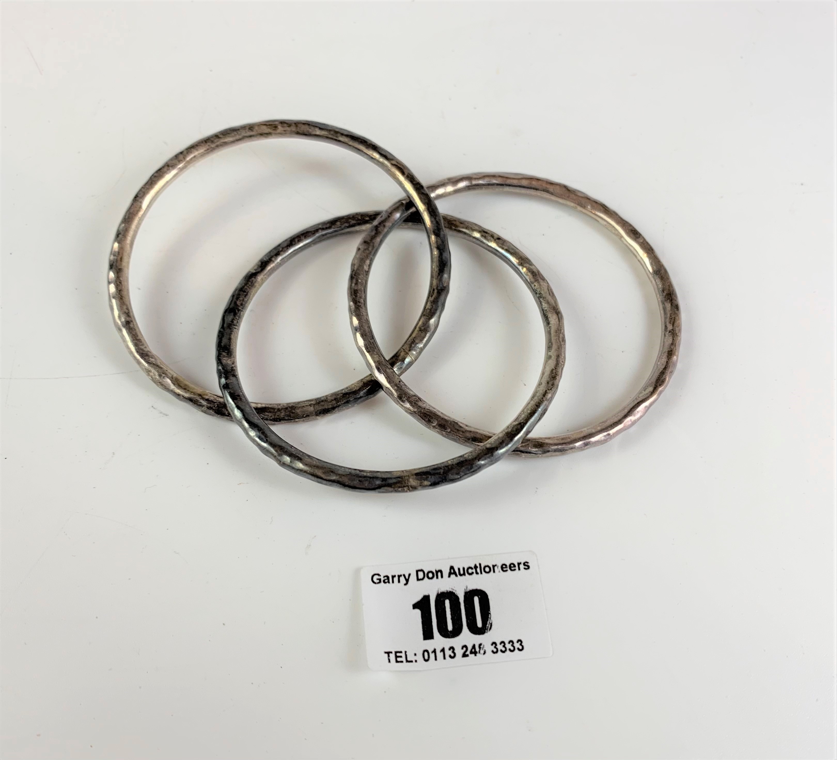 3 interlocked silver bangles, total w: 1.5 ozt