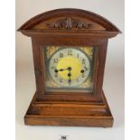 Antique Westminster chime 3 hole mantle clock, 15” high, 12” wide.