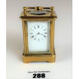 Miniature brass carriage clock, 3” high plus handle. Working with key