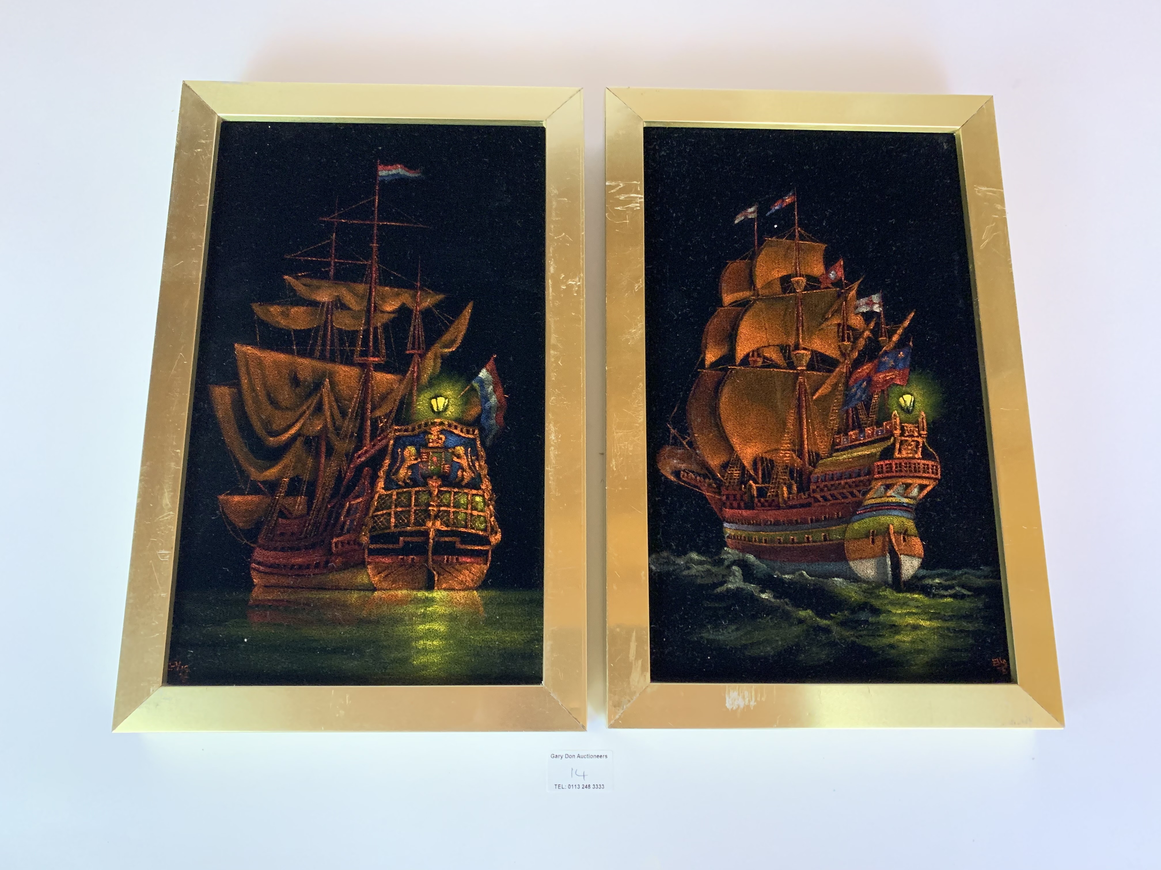 Pair of framed oil paintings on velvet by Vaughan, Brighton. 7.5” x 12”, frame 9.25” x 14”.