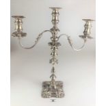 A large silver candelabra inscribed ‘As a token of esteem to Dr. & Mrs. Oscar Williams by a group of