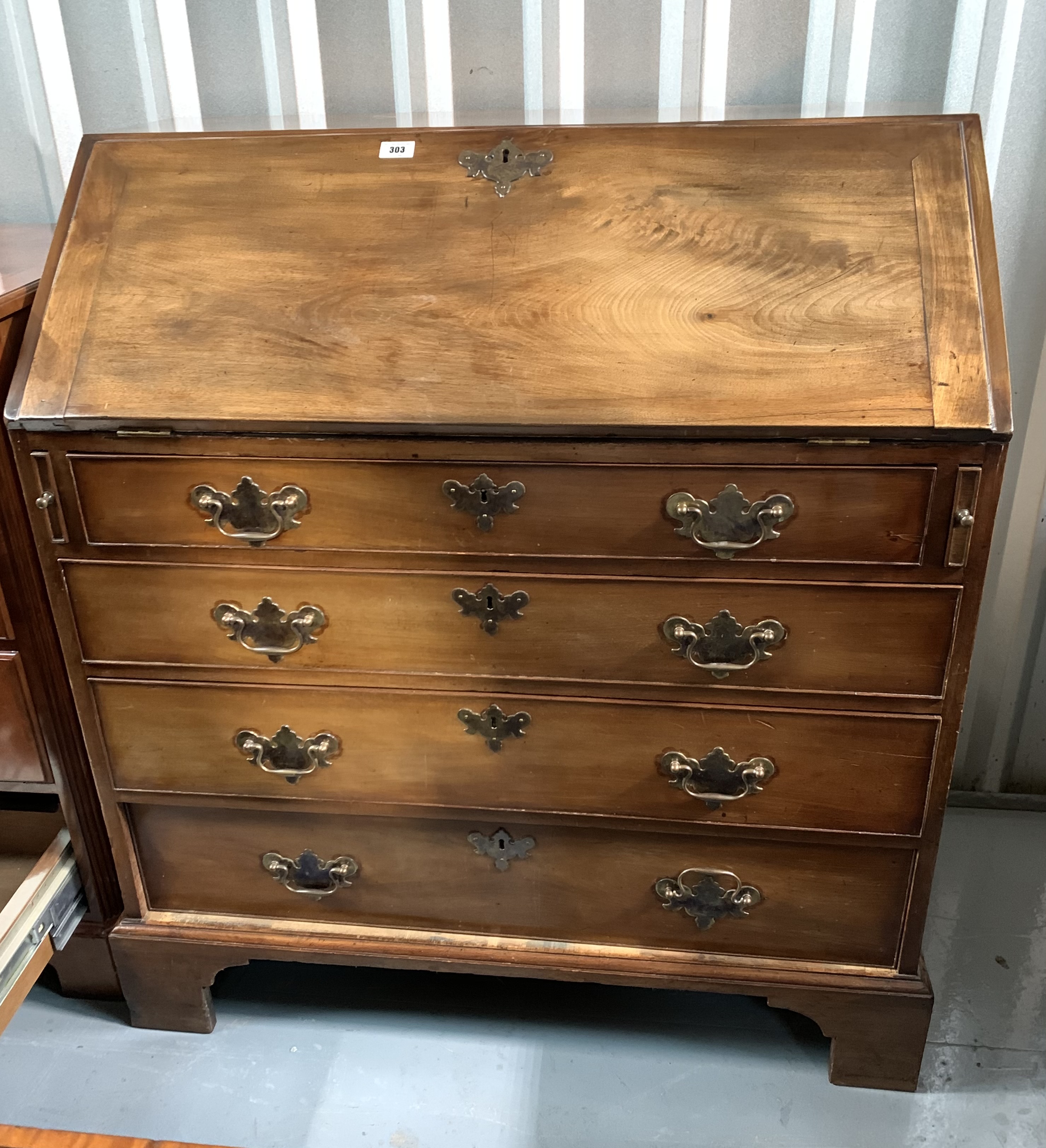 Antique walnut bureau with fitted interior. 40” high, 36” wide, 20” deep