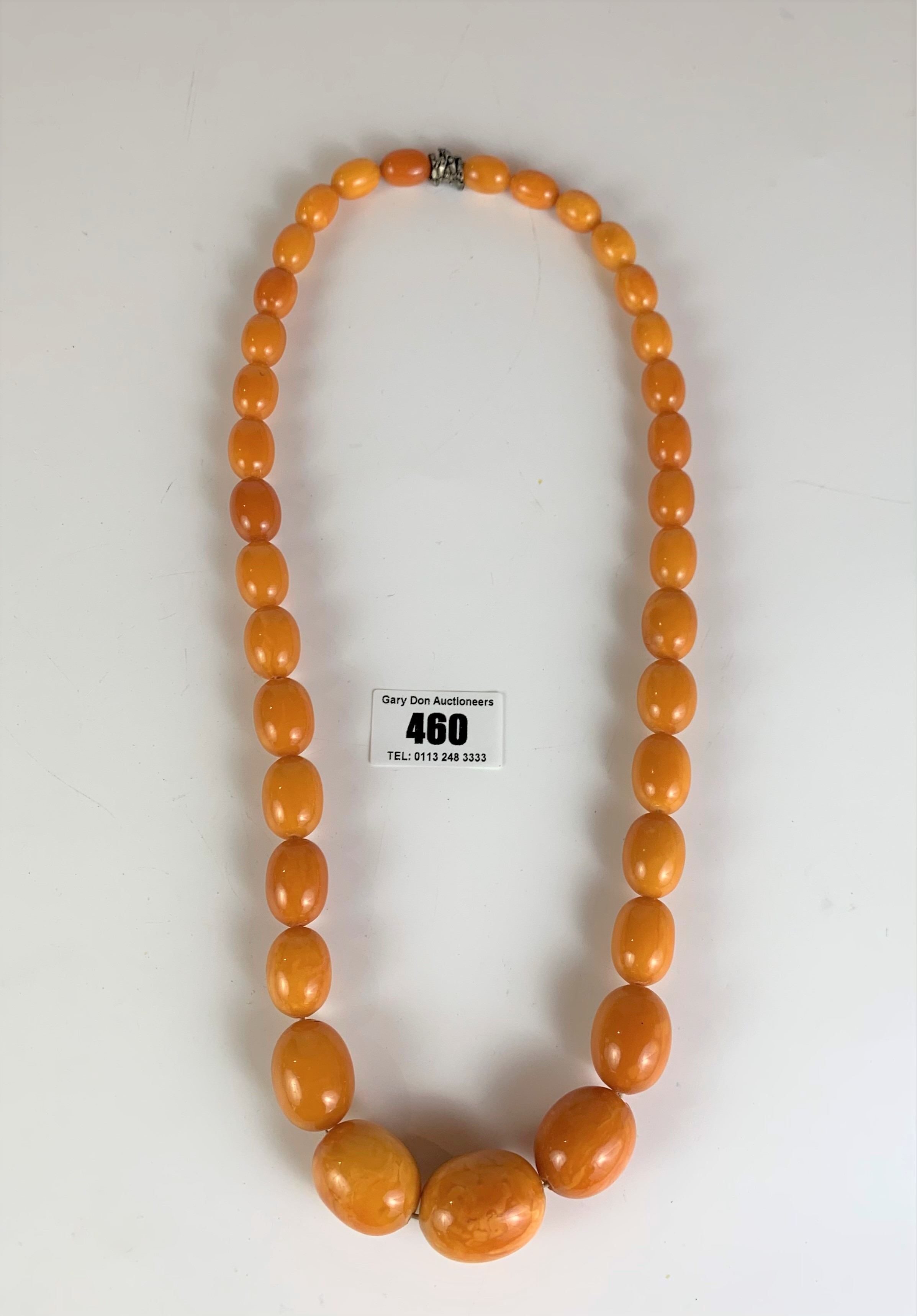Amber necklace with 35 beads, w:89 gms