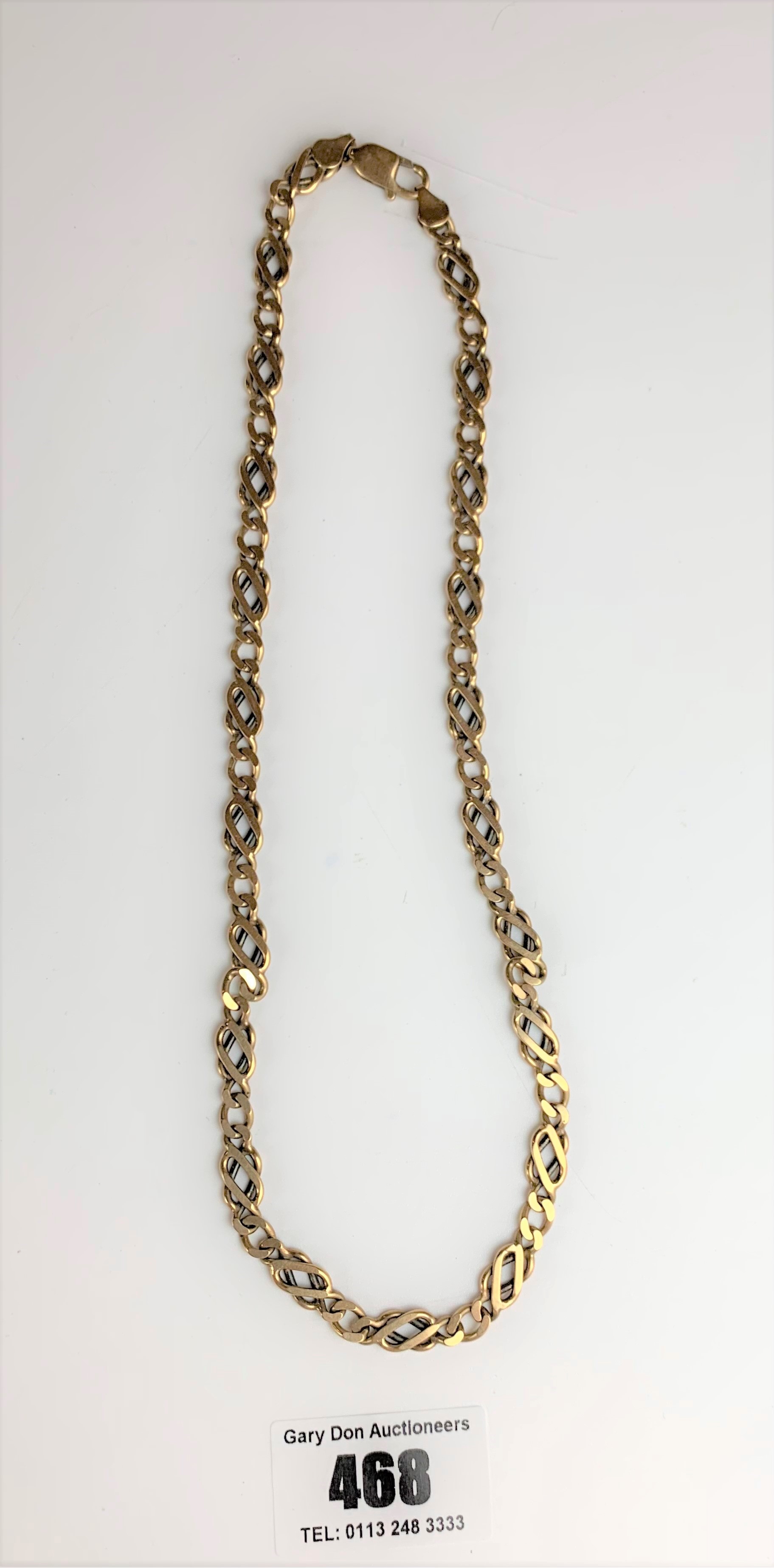 9k gold necklace, length 18”, w: 26.2 gms