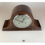 Oak 2 hole mantle clock, 9” high, 16” wide. Working