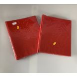 2 red albums of world stamps