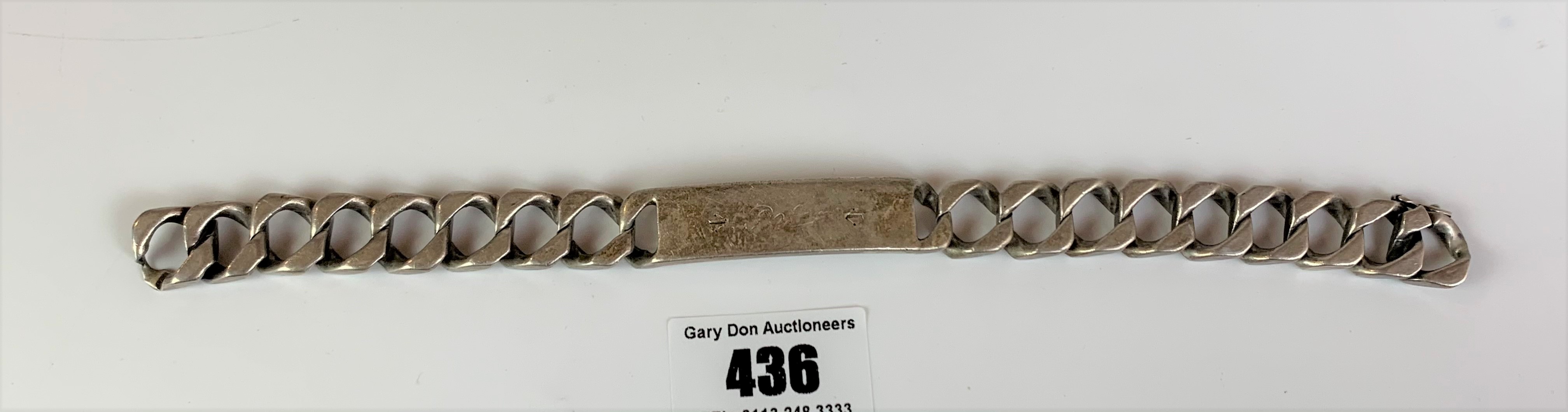 Silver ID bracelet, inscribed ‘Peter’, length 9”, w: 2.1 ozt