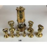 Brass miners lamp by Eccles, 9” high and set of 8 brass weights
