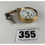 18k gold ladies fob watch, glass missing. 1.5” diameter. Total w: 40 gms. With key, working