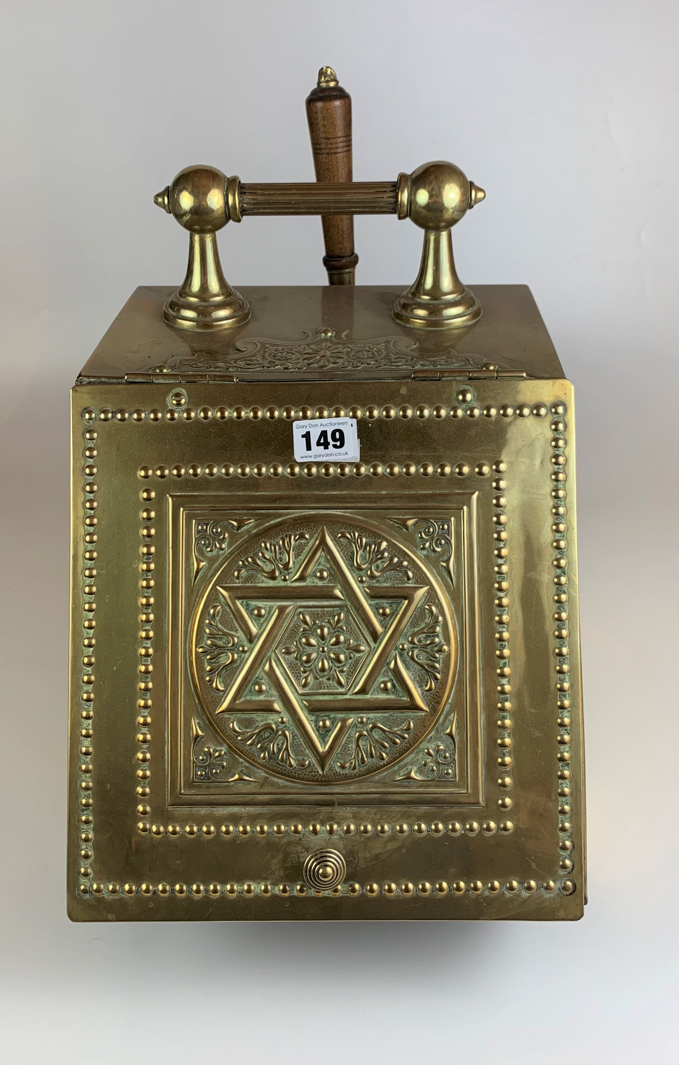 Brass coal box with Star of David design and shovel. 11” long x14” wide x 17” high. Some damage