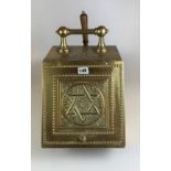 Brass coal box with Star of David design and shovel. 11” long x14” wide x 17” high. Some damage