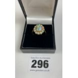 18k gold and opal cluster ring, size Q, w: 3.9 gms
