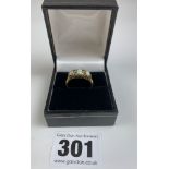 18k gold and 3 stone opal ring, size M, w: 4.8 gms