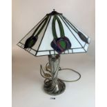 Reproduction Tiffany style lamp with Tudric style base. Working, no damage to shade