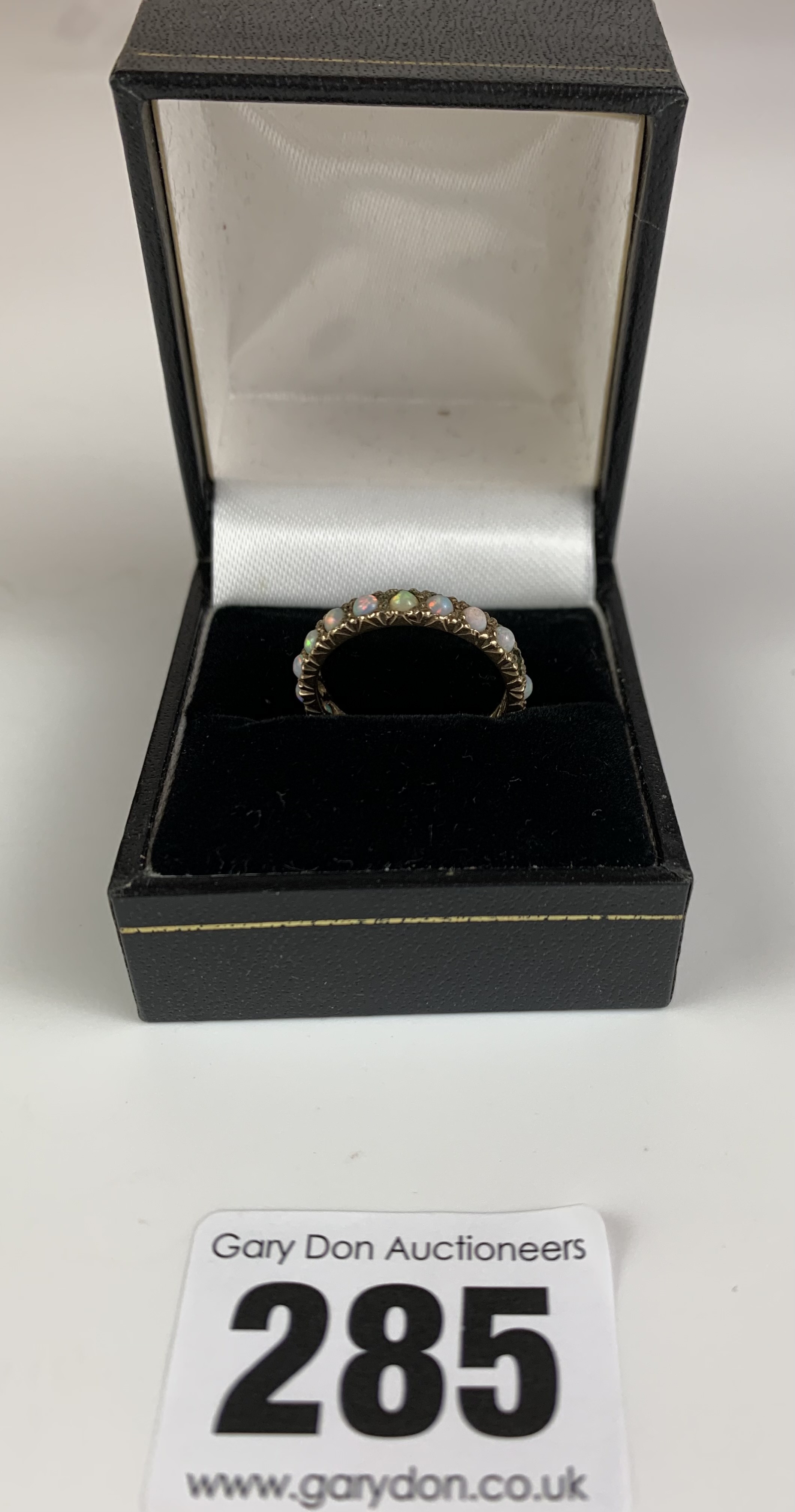 9k gold and opal eternity ring, 1 stone missing, size N, w: 2.1 gms