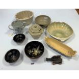 Assorted pottery including jelly mould, shell dish etc. And small cannon