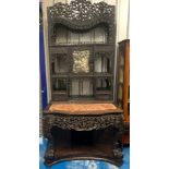 Large Oriental dark wood carved cabinet with marble table top and silk embroidered panel. 43” wide x