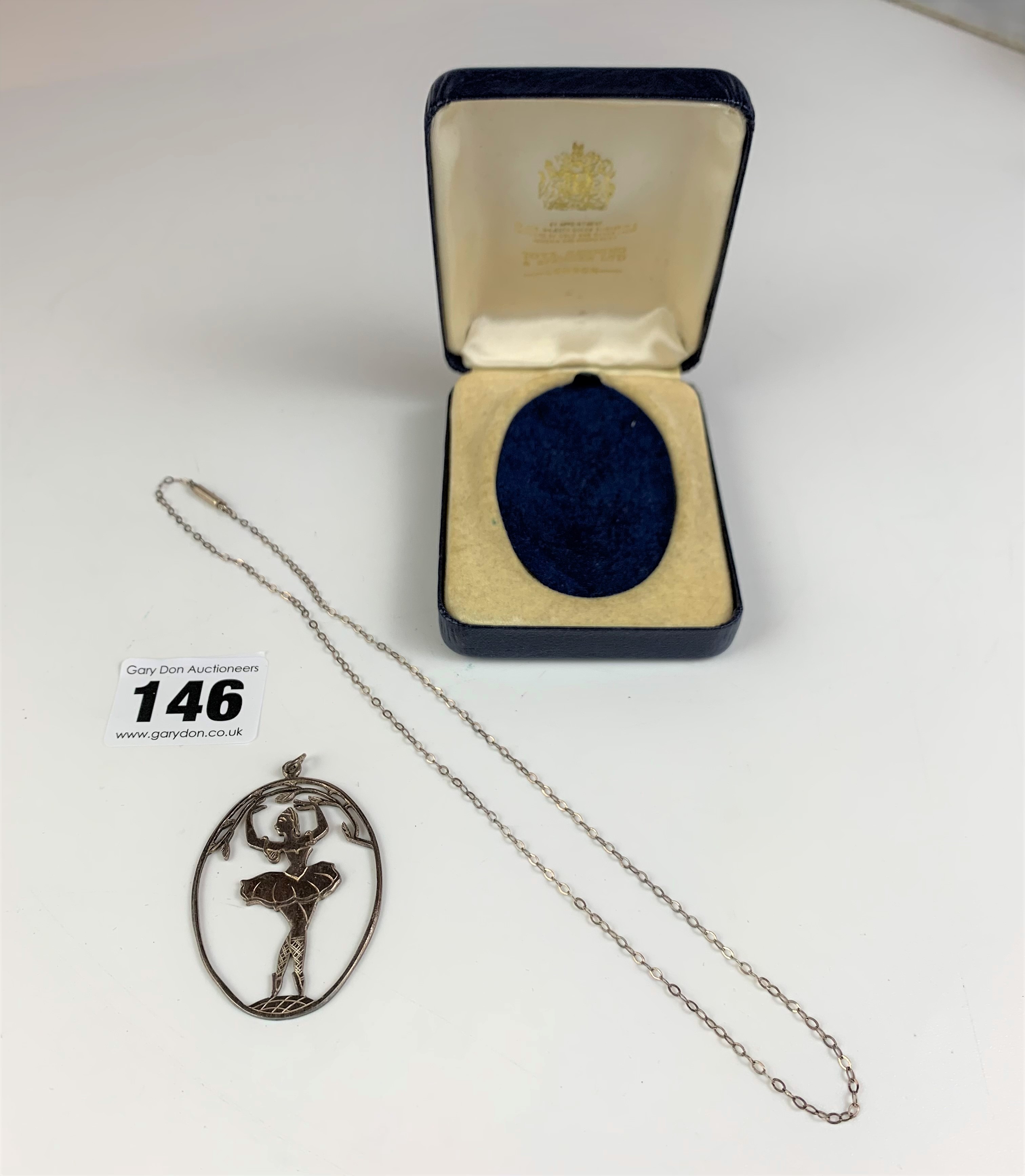 Silver necklace, length 16”, w: 1.1 gms with plated pendant of dancer marked Lohmann, length 2” in