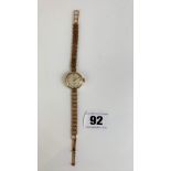 9k gold Uno Masons ladies watch with 9k gold bracelet. Total w: 18.3 gms. Working