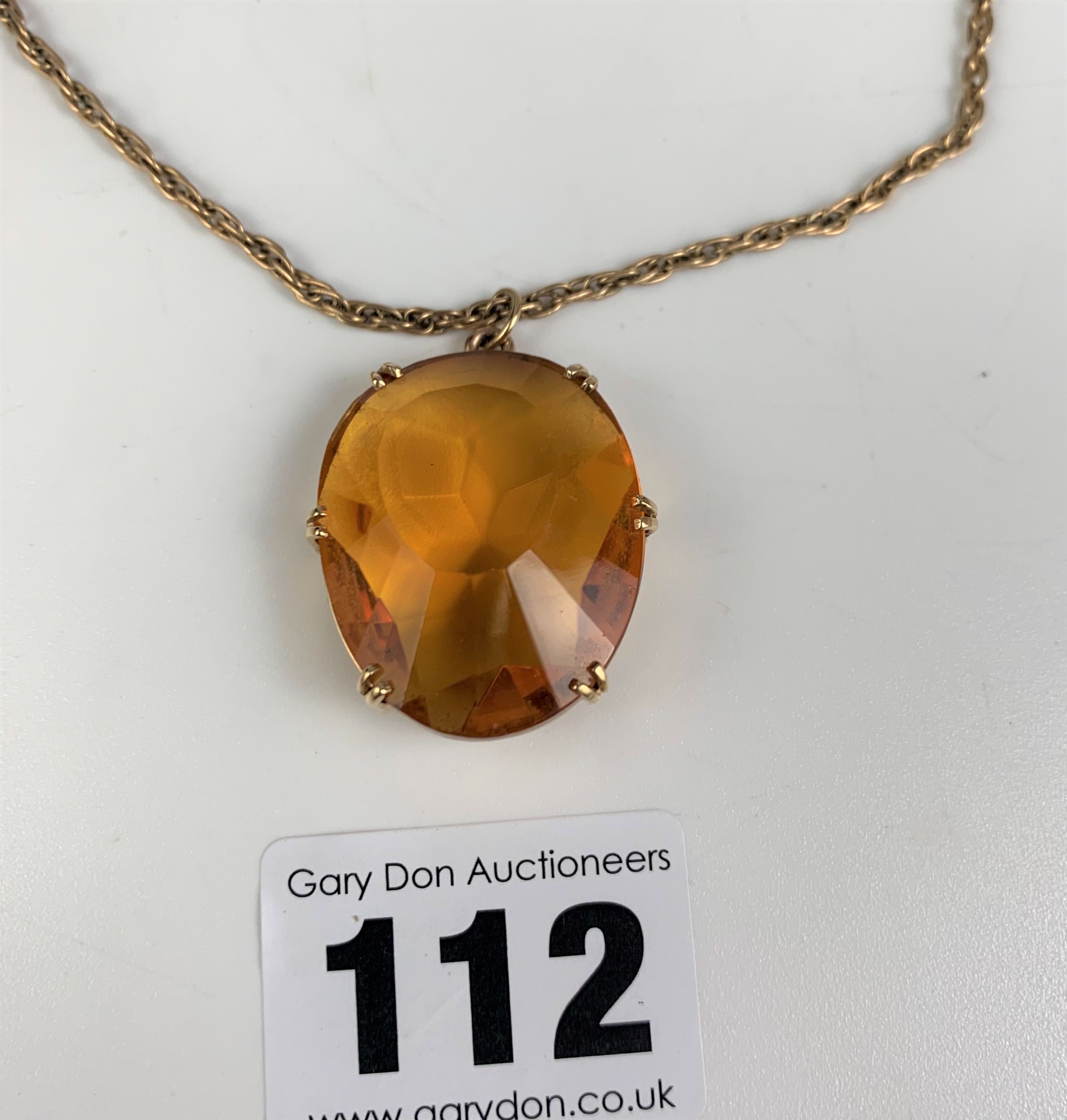 9k gold necklace, length 24” with gold framed orange topaz stone pendant 1.5” length. Total weight - Image 2 of 6